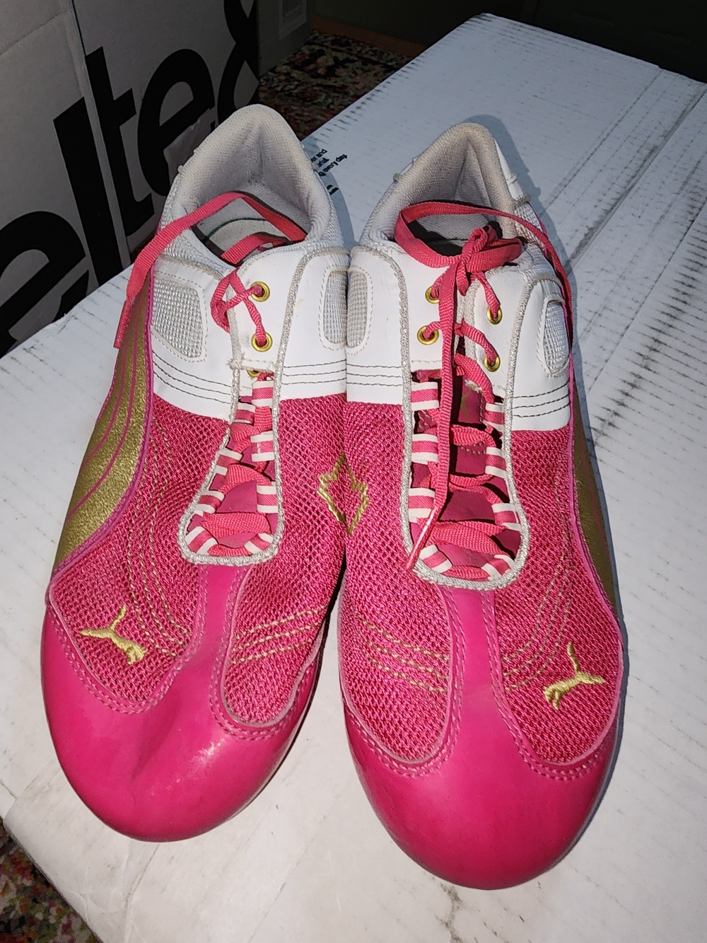 Puma Women’s Pink and Gold Athletic Sneakers